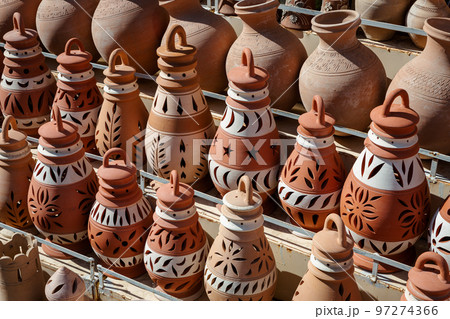 Hand Made Pottery in Nizwa Market. Clay Jars at the Rural Traditional Arabic Bazaar, Oman.  97274366