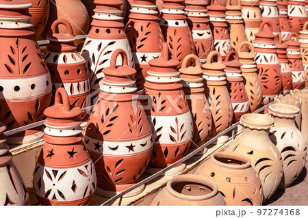 Hand Made Pottery in Nizwa Market. Clay Jars at the Rural Traditional Arabic Bazaar, Oman.  97274368