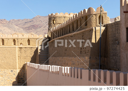 Nizwa city walls. Traditional medieval architecture in Nizwa, Oman.  97274425