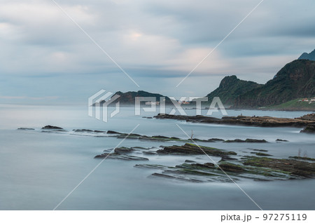 Badouzi Seaside Park in the early morning. Mossy rocks and hills. Badouzi Seaside Park in the early morning. Mossy rocks and hills. 97275119