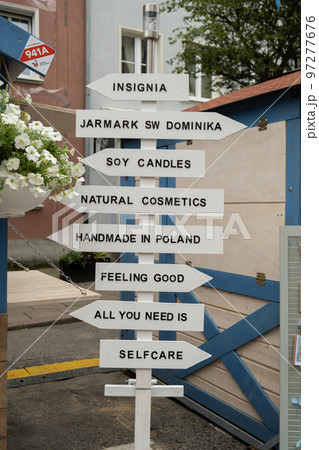 Street signs commercial and cultural event named dominic's fair or Jarmark. Main Town every August. Dominic's Fair in Gdansk and shots of the streets 97277676