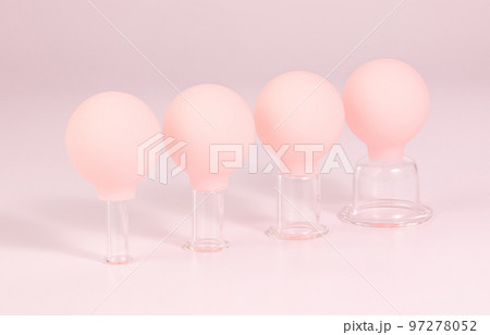 Glass jars for face vacuum massage. Cosmetology and face fitness concept 97278052