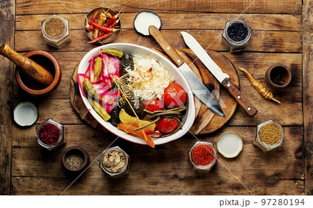 Delicious homemade pickles, marinated vegetables 97280194