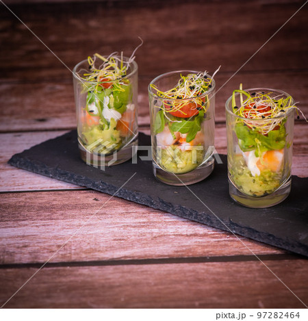 Avocado shrimp arugula mayonaise, espelette pepper and lemon, leek sprouts recipe 97282464
