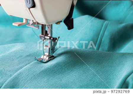 sewing machine and turquoise fabric 97292769