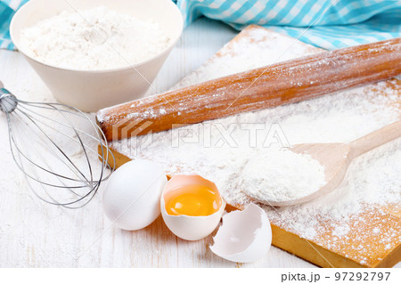 Baking ingredients on white wooden background 97292797