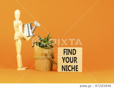 Find your niche symbol. Concept words Find your niche on wooden blocks. Businessman model. Beautiful orange table orange background. Business and find your niche concept. Copy space. Find your niche symbol. Concept words Find your niche on wooden blocks. Businessman model. Beautiful orange table orange background. Business and find your niche concept. Copy space. 97293946