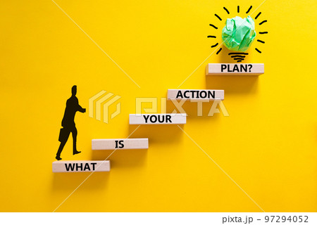 Action plan symbol. Concept words What is your action plan on wooden blocks. Businessman icon. Beautiful yellow table yellow background. Business What is your action plan concept. Copy space. 97294052