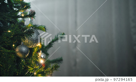 Light beam over the Christmas tree indoor Light beam over the Christmas tree indoor 97294165