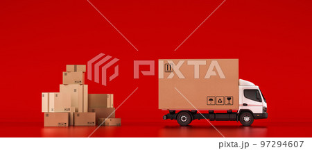 Big cardboard box package on a white truck ready to be delivered on red background Big cardboard box package on a white truck ready to be delivered on red background 97294607