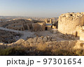 Mount Herodion and the ruins of the fortress of King Herod inside an artificial crater. The Judaean Desert, West Bank. 97301654