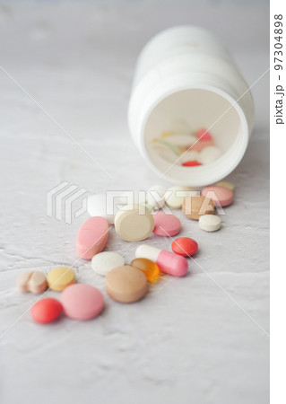 Close up of many colorful pills and capsules Close up of many colorful pills and capsules 97304898