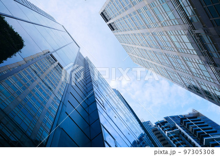 low angle view of singapore city buildings. 97305308
