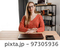 Women freelancing on laptop 97305936