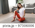 Fitness woman training at home 97306006
