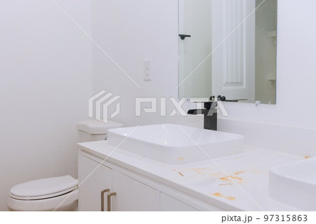 Bathroom with marble sink and shower curtain. Beautiful new master bathroom. 97315863