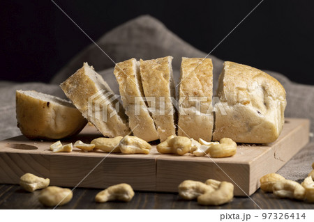 Sliced wheat loaf of fresh bread Sliced wheat loaf of fresh bread 97326414