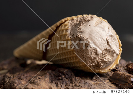 Chocolate ice cream in a waffle cup 97327146