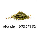 Pile of salted salad herbs isolated on white background 97327862