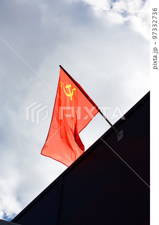 Flag of the USSR on the roof of the building 97332736