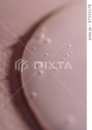 A drop of shampoo on a pink background. A drop of shampoo on a pink background. 97333178