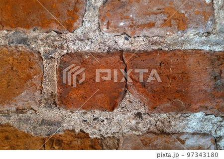 The background of the red brick wall, the texture of the building. The background of the red brick wall, the texture of the building. 97343180