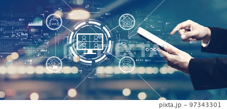Online meeting theme with businessman using a tablet Online meeting theme with businessman using a tablet 97343301