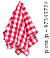 Hanging red checkered kitchen table towel isolated on white. Traditional picnic tablecloth. 97343724