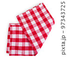 Red checkered kitchen table towel isolated on white. Folded picnic tablecloth 97343725