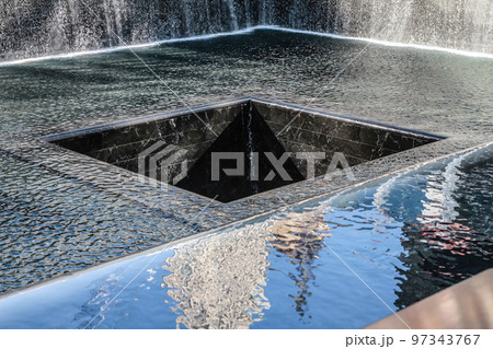 New York, Ground Zero, hole and fountain in tribute to the victims of September 11 97343767