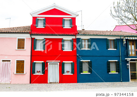 Burano Venice Red house and blue house Burano Venice Red house and blue house 97344158