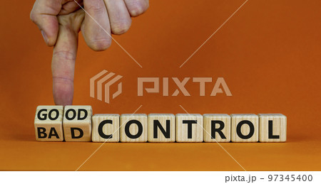 Bad or good control symbol. Businessman turns wooden cubes and changes words 'bad control' to 'good control'. Beautiful orange background. Business and good control concept. Copy space. Bad or good control symbol. Businessman turns wooden cubes and changes words 'bad control' to 'good control'. Beautiful orange background. Business and good control concept. Copy space. 97345400