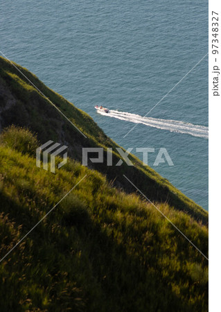 Boat sailing the sea at high speed. Rimini Italy 97348327