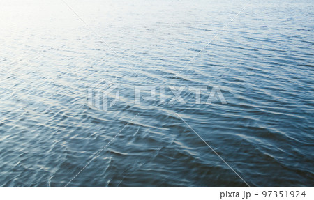 Water surface with ripples 97351924