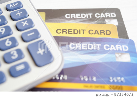 Credit card with password key lock and US dollar banknote money, security finance business concept. 97354073