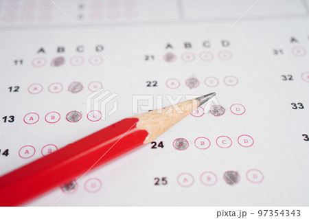 Answer sheets with pencil drawing fill to select choice, education concept. 97354343