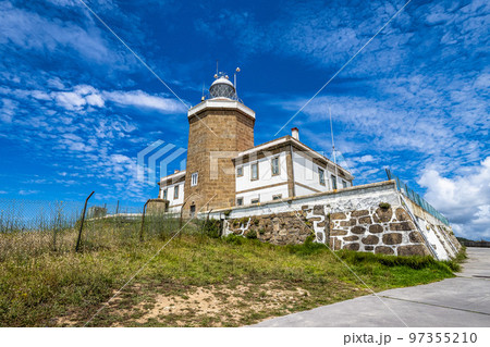 Finisterre Cape Lighthouse, Costa da Morte, Galicia, Spain. End of Saint James Way. 97355210