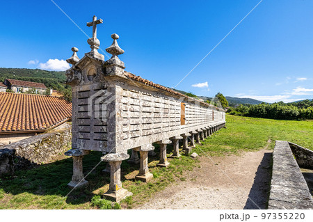 The long and narrow grain store, horreo at Carnota in Galicia, Spain. 97355220