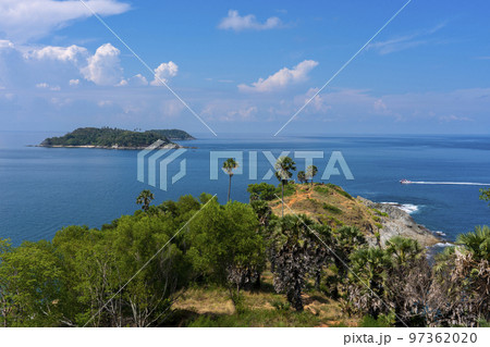 Promthep Cape is one of the most photographed locations in Phuket. Phromthep cape viewpoint at blue sea sky in Phuket, Thailand. 97362020