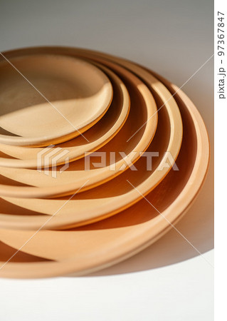 Abstract background and texture of terracotta plates. 97367847