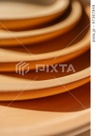 Abstract background and texture of terracotta plates. 97367848