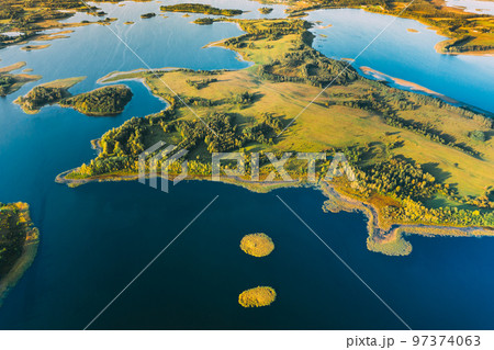 Braslaw Or Braslau, Vitebsk Voblast, Belarus. Aerial View Of Nedrava Lake And Green Forest Landscape In Sunny Autumn Morning. Top View Of Beautiful European Nature From High Attitude. Bird's Eye View 97374063