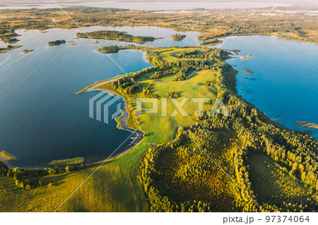 Braslaw Or Braslau, Vitebsk Voblast, Belarus. Aerial View Of Nedrava Lake, Green Forest And Meadow Landscape In Sunny Autumn Morning. Top View Of Beautiful European Nature From High Attitude. Bird's 97374064