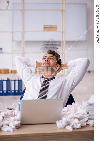 Young male employee in rejected ideas concept 97385650