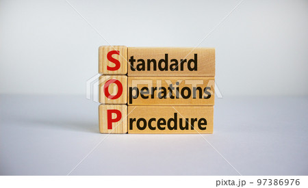 SOP - standard operations procedure symbol. Concept word 'SOP - standard operations procedure' on cubes and blocks on a beautiful white background. Business and SOP concept. Copy space. SOP - standard operations procedure symbol. Concept word 'SOP - standard operations procedure' on cubes and blocks on a beautiful white background. Business and SOP concept. Copy space. 97386976