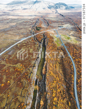 Vertical photo aerial view of Thingvellir National Park and two roads crossing in the park Vertical photo aerial view of Thingvellir National Park and two roads crossing in the park 97387504
