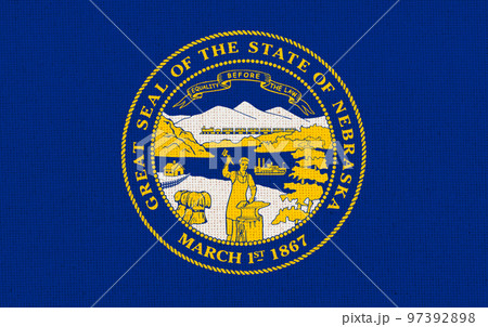 Flag of American state Nebraska on textured surface. Symbol of Nebraska 97392898