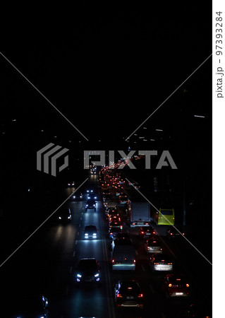 Kyiv, Ukraine - December 16, 2022: Blackout in the Ukrainian capital Kyiv. Capital streets without street lighting. Only the lights of passing cars are visible Kyiv, Ukraine - December 16, 2022: Blackout in the Ukrainian capital Kyiv. Capital streets without street lighting. Only the lights of passing cars are visible 97393284