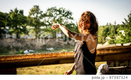 woman points with her hand woman points with her hand 97397324