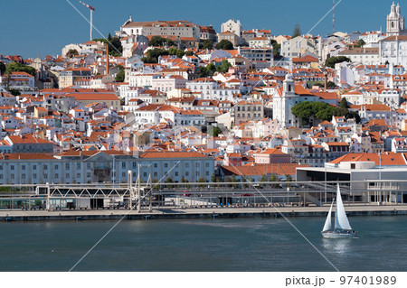 Sailboat on Lisboa Tagus River, waterfront and cityscape. Vacation, leisure, travel concept. 97401989